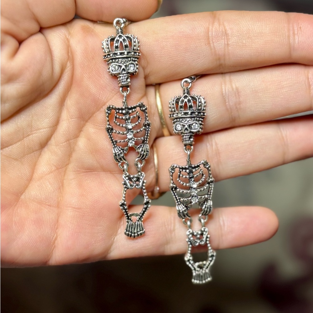 Silver Skeleton Earrings with Articulated Design and Rhinestones